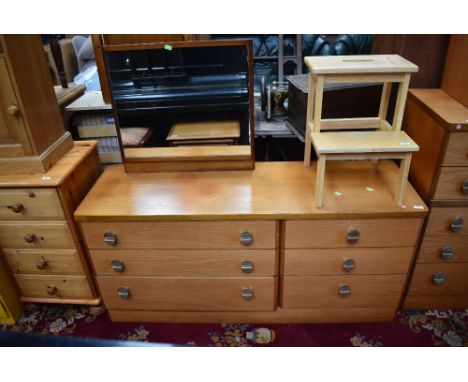 A vintage teak and laminate dressing table having offset configuration