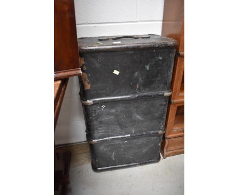 An antique had bodied and ribbed travel trunk or suitcase