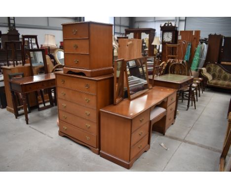 A selection of light stained Stag bedroom furniture comprising dressing table and two sets of drawers