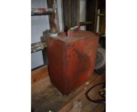 A vintage fuel or oil can having brass lid
