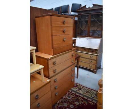 Two vintage teak and laminate bedroom chests of drawers, same design as the previous lot dressing table