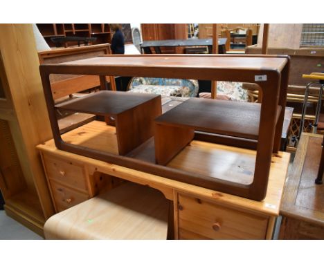 A vintage G plan or Danish teak coffee table , interesting design with undershelves and magazine rack style centre