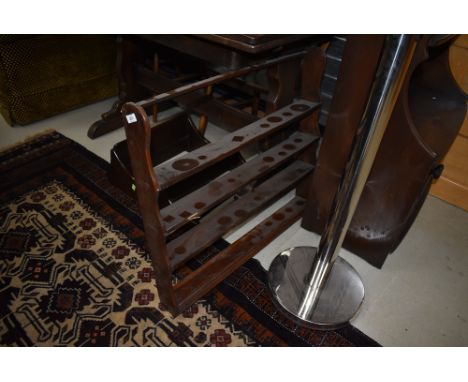 Two dark stained Ercol wall shelves