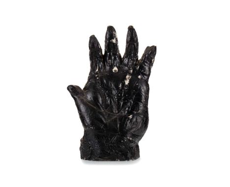 BLACK PAINTED PLASTER MODEL OF A GORILLA HAND 20TH CENTURY unmarked30.5cm high