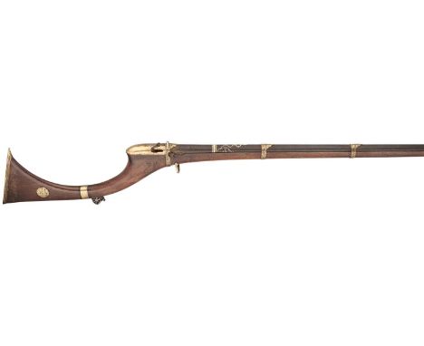 A 28 BORE NORTH INDIAN (SIND) MATCHLOCK RIFLE, EARLY 19TH CENTURY  with tapering etched twist sighted barrel of ‘hog’s back’ 