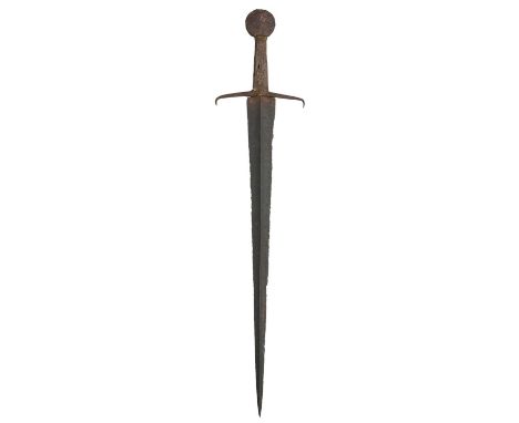 A COMPOSITE MEDIEVAL SWORD OF CASTILLON TYPE, 15TH CENTURY  ‡ in excavated condition, with sharply tapering blade of flattene