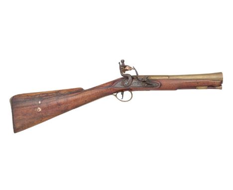 A FLINTLOCK BLUNDERBUSS BY SEARLES, LONDON, CIRCA 1790  with copper alloy barrel formed swelling towards the muzzle, octagona