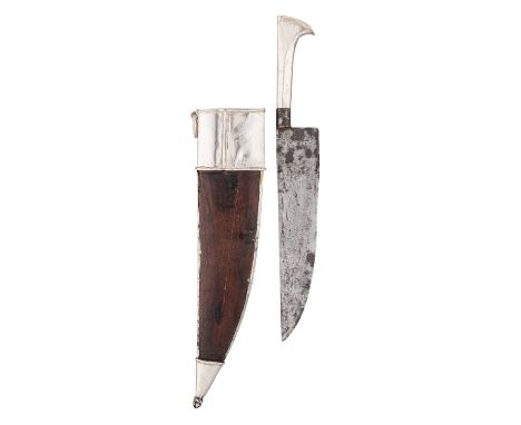 AN INDIAN SILVER-MOUNTED DAGGER, 19TH CENTURY  with broad single-edged blade, short iron ferrule, silver grip with asymmetric