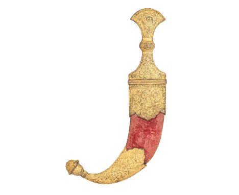 AN ARAB DAGGER (JAMBIYA), KUTCH, LATE 19TH CENTURY with curved medially-ridged double-edged blade, copper alloy hilt of chara