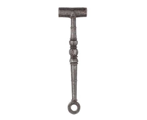 A WHEEL-LOCK SPANNER, 17TH CENTURY  ‡ formed entirely of steel, with T-shaped spanner head, moulded neck with a swivelling su