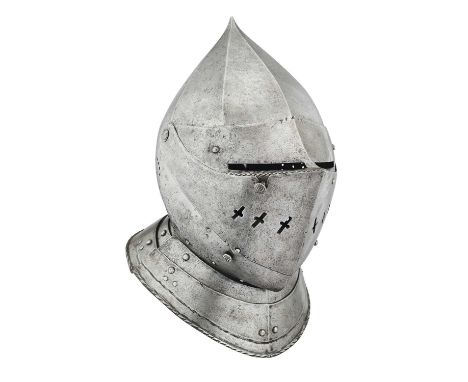 A RARE SOUTH GERMAN CLOSE HELMET, CIRCA 1560  ‡ with finely formed skull boxed in eight sections and drawn out to an acute po