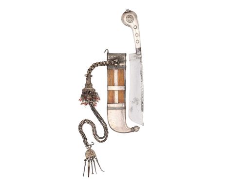 A COORG DAGGER (PICHANGATTI), 19TH CENTURY  with hatchet blade formed with a clipped-back point and decorated with scrolls al