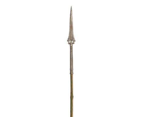 AN INDIAN LANCE, 18TH/19TH CENTURY  with sharply tapering head formed with a reinforced point, openwork base formed of a pair