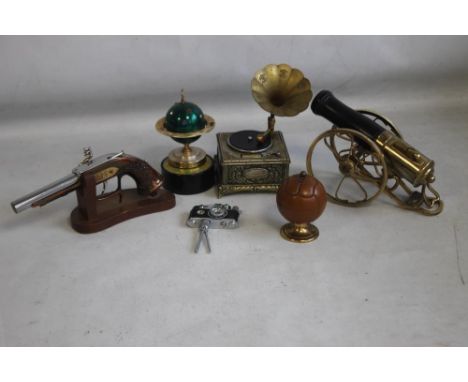 A SMALL COLLECTION OF VINTAGE NOVELTY TABLE LIGHTERS, to include a football, camera on tripod, in original cardboard box etc