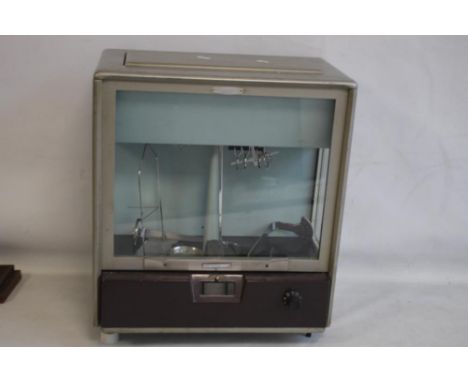 A CASED SET OF VINTAGE RELEASE-O-MATIC SCALES A/F