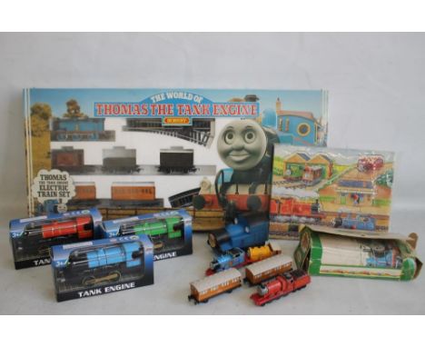 HORNBY THE WORLD OF THOMAS THE TANK ENGINE ELECTRIC TRAIN SET, still has shrink wrap. together with three boxed diecast engin