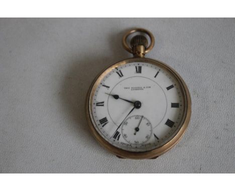 A 9ct GOLD OPEN FACE TOP WIND POCKET WATCH, white enamel dial signed 'Thos Russell and Son Liverpool'.
