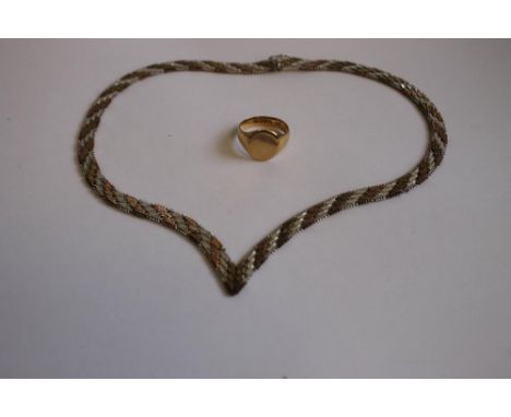 AN 18ct GOLD SIGNET RING, together with a three colour silver wishbone necklace, weight of 18ct gold ring 6g
