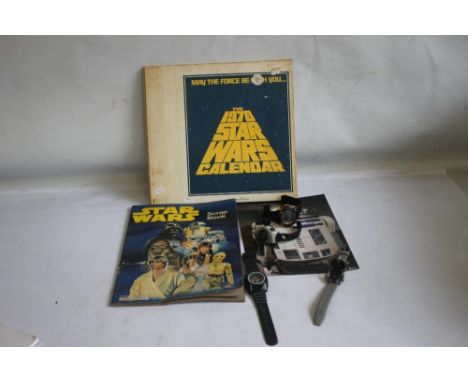 STAR WARS 1978 CALENDAR IN ORIGINAL CARD PACK, together with a scrap book, a R2D2 wrist watch, a compass etc