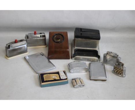 A COLLECTION OF VINTAGE AND RETRO CIGARETTE AND TABLE LIGHTERS, to include a boxed Hudson watch type, desk ashtray etc