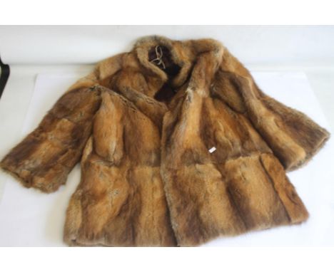 A VINTAGE LADIES' FUR COAT