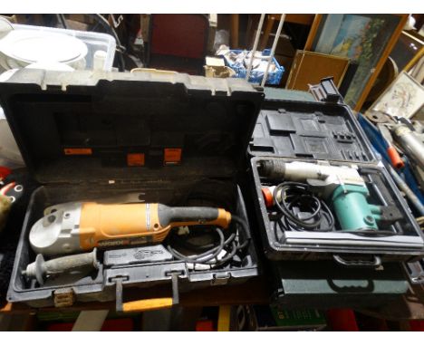     Two Boxed Power Tools                                                           