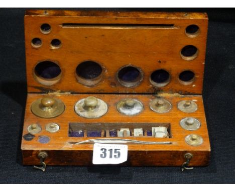     A Mahogany Cased Apothecary Scale Weight Set                                    