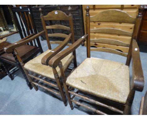     A Pair Of Rush Seated Oak Ladder Backed Carver Chairs                           