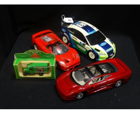     Four Scale Model Vehicles                                                       