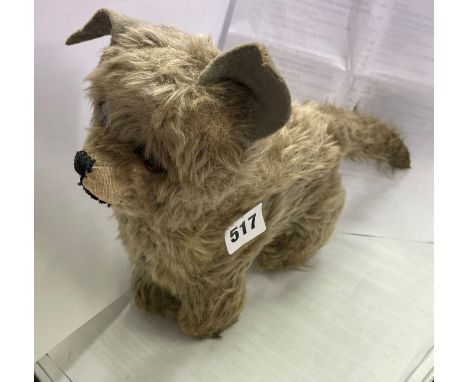 A VINTAGE PLUSH TOY DOG