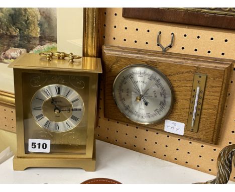 JAMES WALKER QUARTZ CARRIAGE CLOCK BATTERY OPERATOR AND A WALL HANGING BAROMETER 