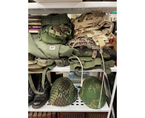 SELECTION OF ARMY CAMOUFLAGE FATIGUES, PONCHO, OVERCOATS, SCARF, SNOOD, TWO TIN HELMETS AND BELTS