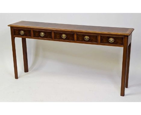 A walnut and figured walnut five drawer hall table, having a cross and feather banded top and raised on chamfered square supp