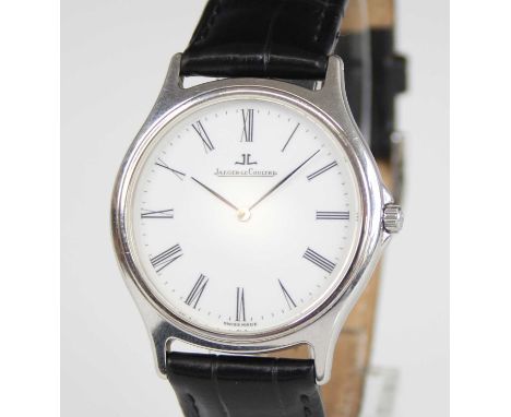 A stainless steel Jaeger LeCoultre Heraion quartz wristwatch, with round white Roman dial, fitted to a black leather strap wi