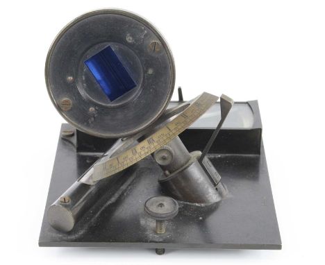 A mid-19th century dipleidoscope, the circular brass dial with blue glass aperture containing two mirrors on an inclined pill