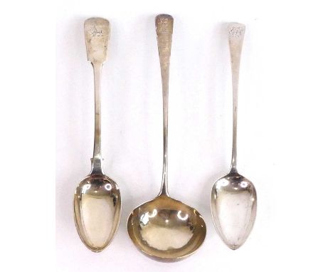 A George III silver soup ladle, in the Old English pattern with engraved armorial to the terminal, maker TW (possibly Thomas 