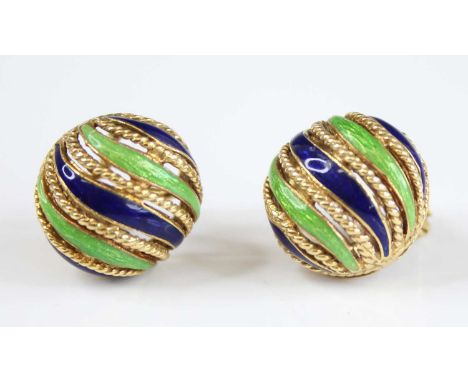 A pair of yellow metal oval domed earrings, each having blue and green enamel inlay alternating with ropetwist detail, clip f