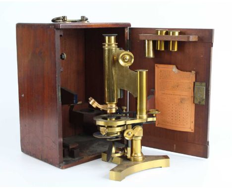 R &amp; J Beck of London - a lacquered brass monocular microscope, numbered 19427, in fitted mahogany case with additional le