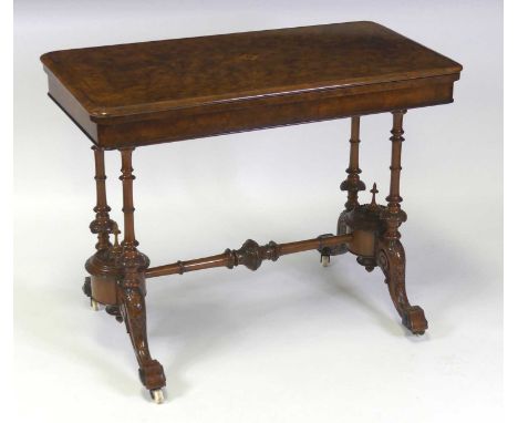 A mid-Victorian burr walnut and marquetry inlaid card table, having four-quarter veneered fold-over top with swivel action, o