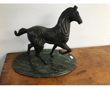 A bronze Etruscan-style horse on serpentine base