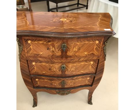 A Louis XVI-style inlaid Bombe Commode