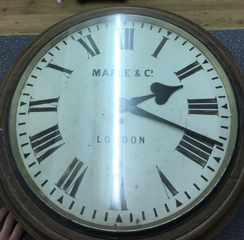 A large dial station clock, fusee movement, pendulum dial written Maple & Co, London