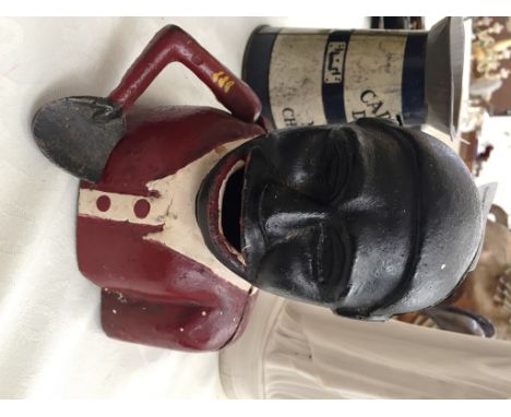 A figural automaton money box