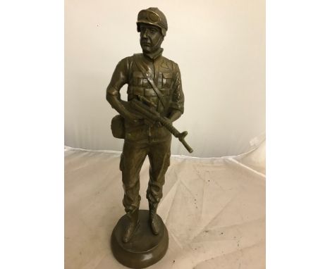 A bronze model of a military soldier