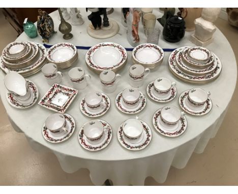 A Royal Worcester Holly Ribbons part-dinner service