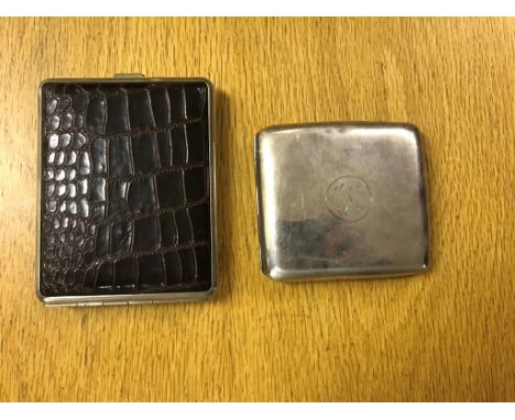 A HM silver cigarette case; together with one other