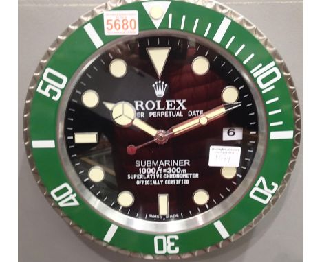 Dealers wall clock with smooth sweeping second hand. With luminous hands and numerals and green bezel. P&amp;P Group 3 (£25+V