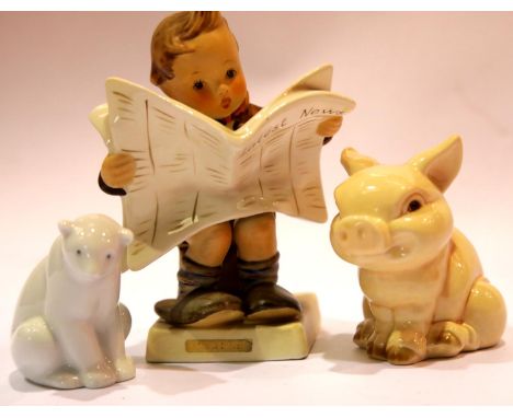 Goebel boy reading newspaper and pig and a Nao polar bear. P&amp;P Group 2 (£18+VAT for the first lot and £2+VAT for subseque