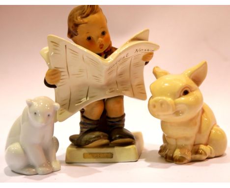 Goebel boy reading newspaper and pig and a Nao polar bear. P&amp;P Group 2 (£18+VAT for the first lot and £2+VAT for subseque