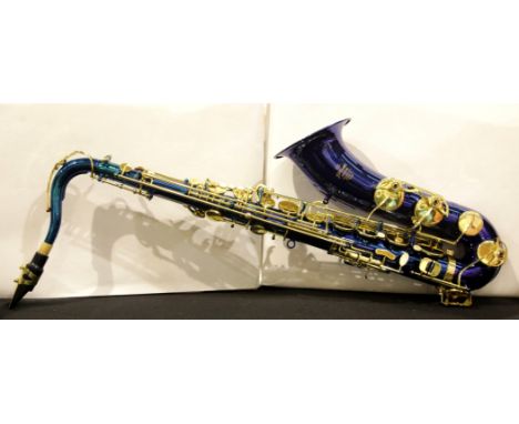 Stagg Bb tenor saxophone in blue model 77-ST/B2 in an ABS case, believed to be complete. P&amp;P Group 3 (£25+VAT for the fir